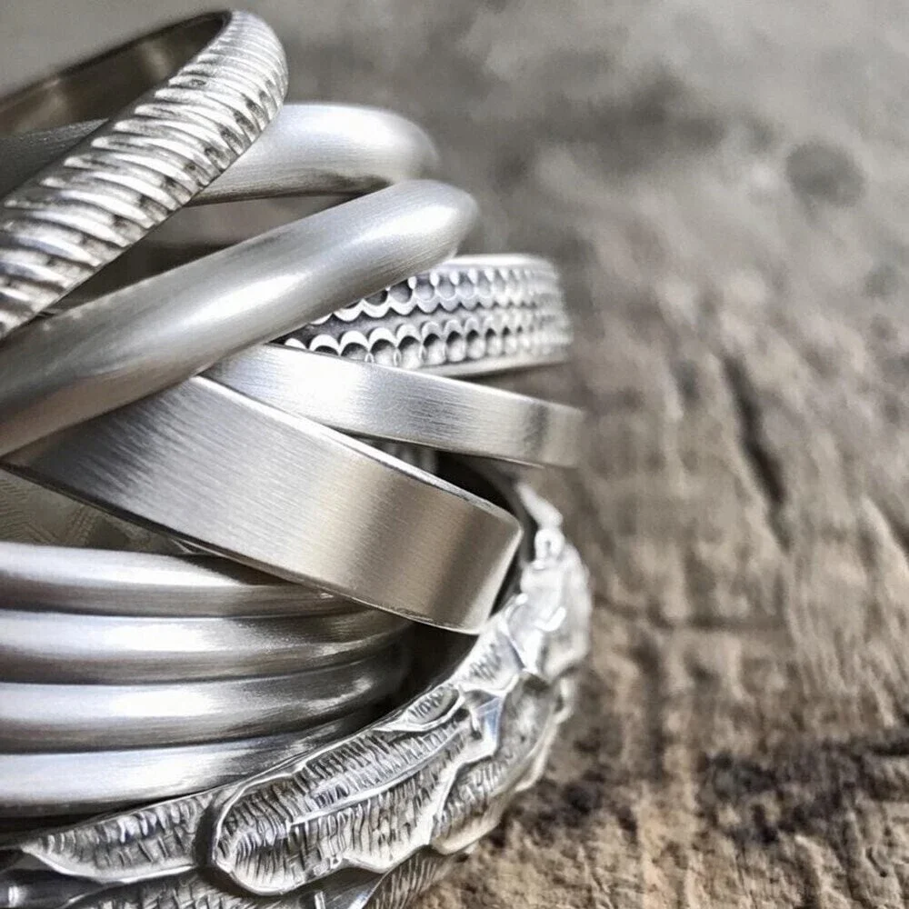 Brushed sterling silver woven tartan plaid pattern open cuff bangle bracelet.